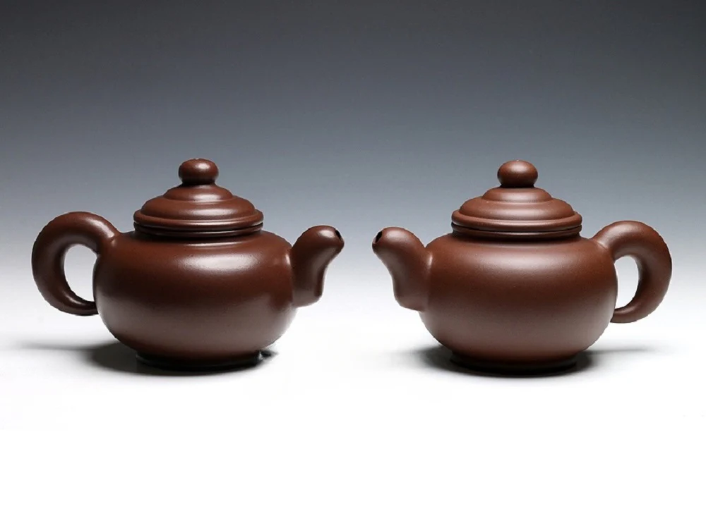 New vs raised Yixing teapot